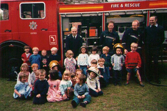 Oxted show the Kids from Little Barn around the appliance.