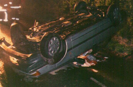 Road Traffic Accident with Inverted Saloon Car.