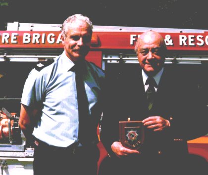 Picture of Sub Officer John Masters (Retired) and Mohamed Al Fayed at the Oxted Firestation open day, July 1999.
